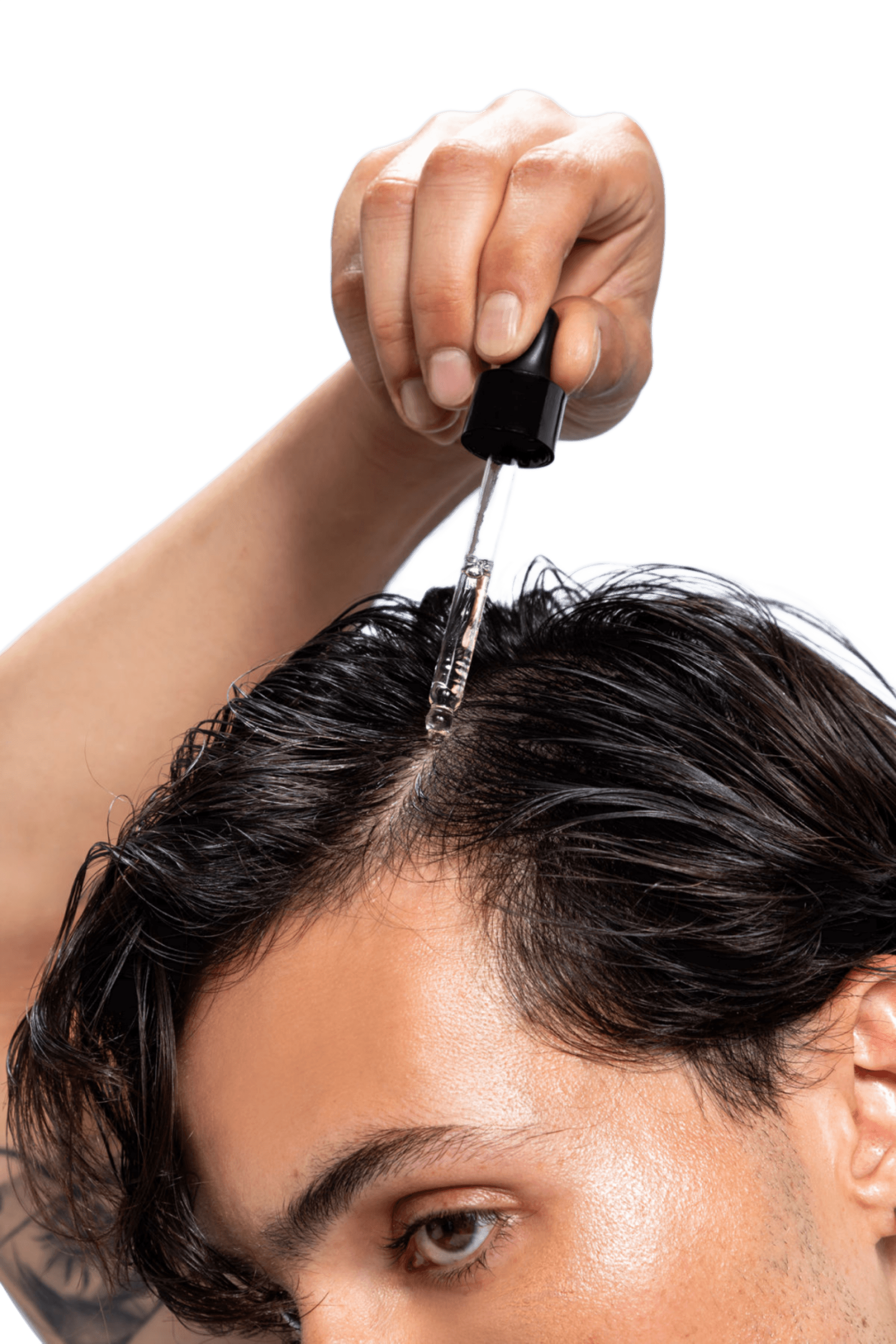 Applying a Hair Rescue topical directly to the scalp